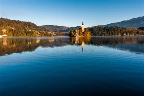 Sunrise at Lake Bled in the Fall. Stock Photo - Image of chapel, cold ...