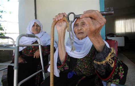 A 102 Year Old Palestinian Woman Holds The Key Of Fuck Yeah Marxism Leninism