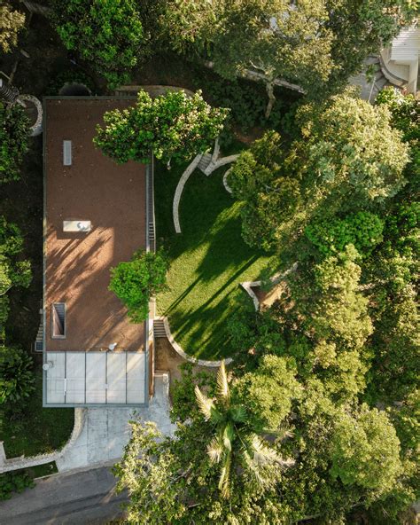 Denis Joelsons Juxtaposes Linear House With Circular Gardens In São Paulo