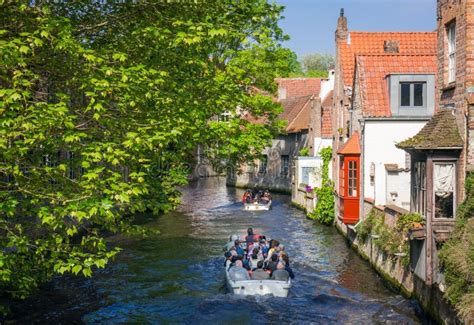 Tourists on a Canal Boat Tour in Bruges Editorial Photo - Image of flemish, spring: 50976891