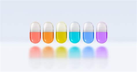 Premium Photo Pills In Rainbow Color Concept Of Selecting Treatment