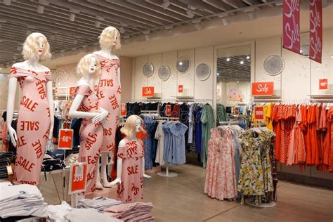 Sale And Discount Banners In A Women`s Clothing Retail Store Stock