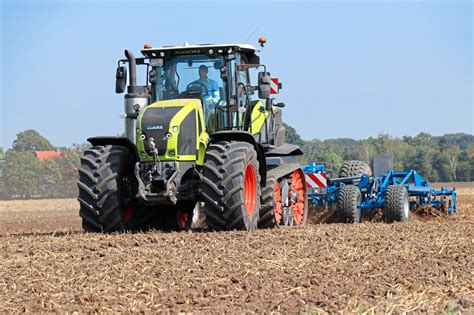 Gülleprofis 2023 Claas Axion 960 TT Traktor mit Wienhoff Güllefass