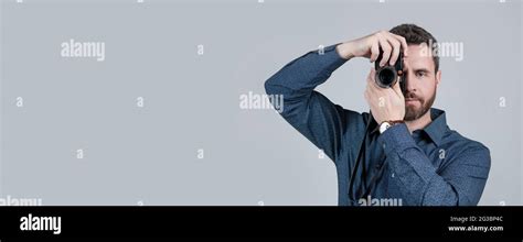 Amateur Photographer Shoot Picture With Handheld Photo Camera Grey Background Shooting Stock