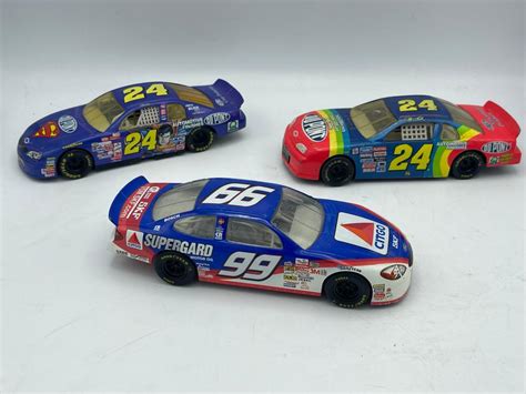 Lot - Lot of 2 Diecast 1/24 scale racing champions cars