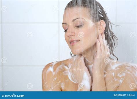 Young Beauty Woman In The Bath Washing Her Body Royalty Free Stock