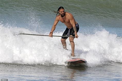 Jason Momoa Exhibits His Toned Chest As He Goes Surfing In Hawaii