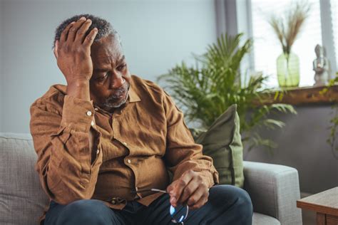 Frustrated Unhealthy Senior Mature Man Touching Head Thyroid And