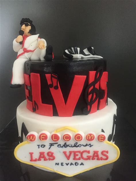 a las vegas themed wedding cake with the bride and groom on top