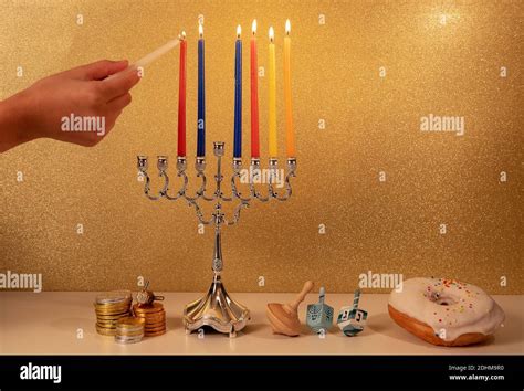 Day 6 Of Jewish Religious Holiday Hanukkah With Childs Hand Lighting