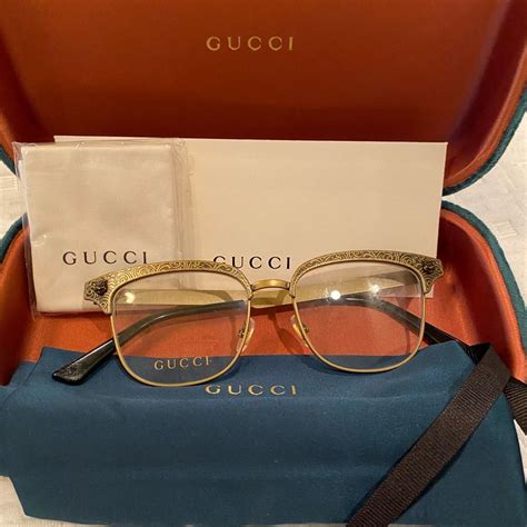 Gucci gold frame glasses | Gucci cat eye sunglasses, Metal frame ...