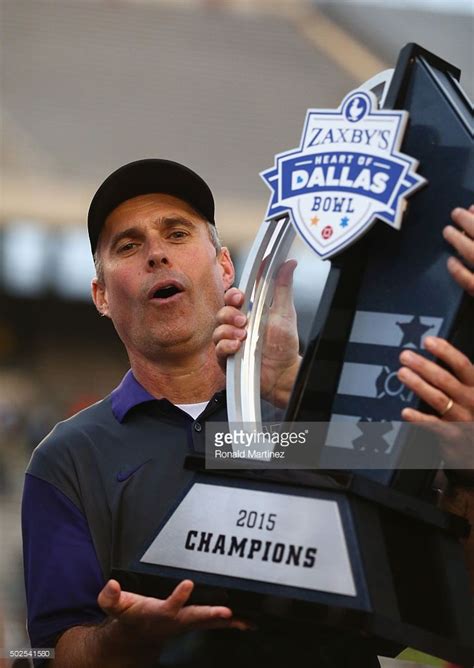 head-coach-chris-petersen-of-the-washington-huskies-holds-up-the ...