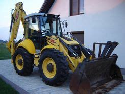 Koparko Adowarka New Holland B B Opinie I Ceny Na Ceneo Pl