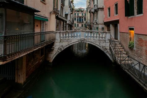 Premium Photo | A bridge over a canal in venice