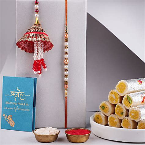 Buy Send Sneh Pearl Bhaiya Bhabhi Rakhi Set Kaju Rolls Online FNP