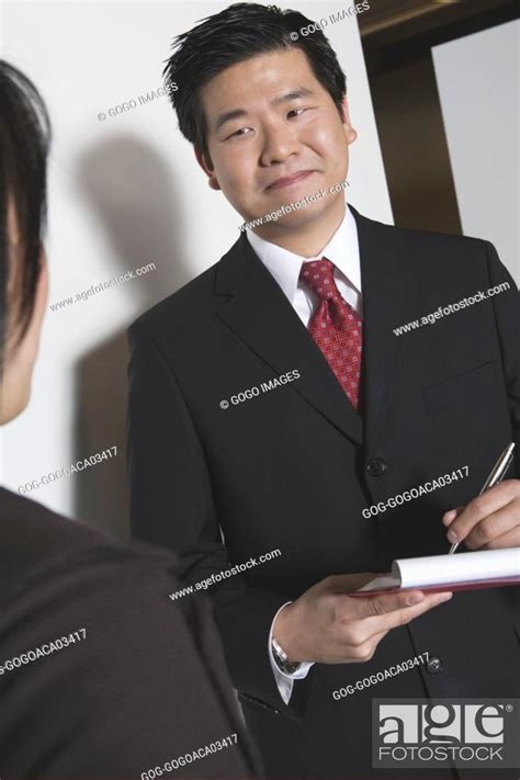 Businessman Taking Notes Stock Photo Picture And Royalty Free Image