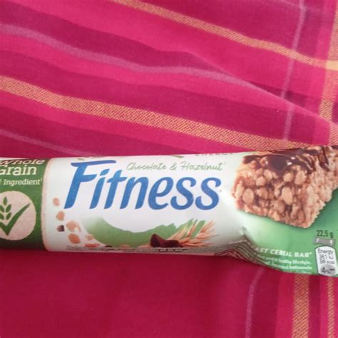 Батончик злаковый с шоколадом м фундуком Fitness Nestlé - калорийность ...