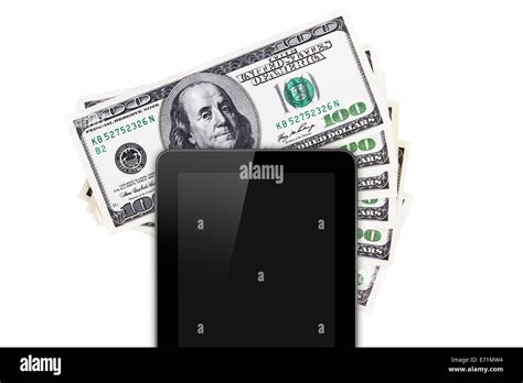 Finance Concept Tablet With Blank Screen On One Hundred Dollar