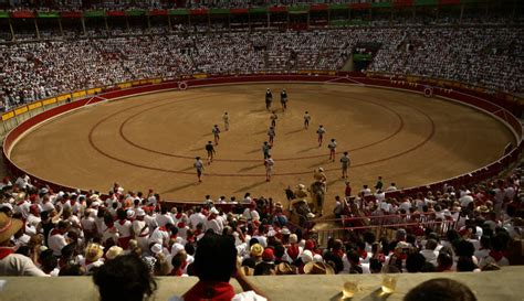 Runners Dodge Bulls in Pamplona