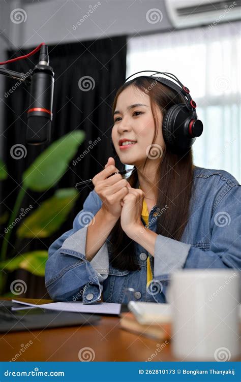 Talented Asian Female Online Radio Host Or Podcaster Broadcasting In