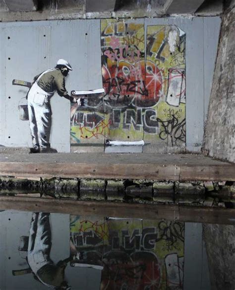 graffiti walls: Banksy Graffiti War with Fellow Street by Artist King Robbo