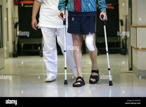 Hospital, physiotherapy after knee surgery Stock Photo - Alamy