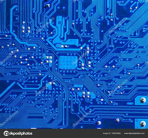 Blue circuit board background of computer motherboard Stock Photo by ©bukhta79 189553666