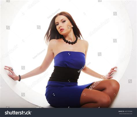 Sexy Brunette Blue Dress Sitting Circle Stock Photo