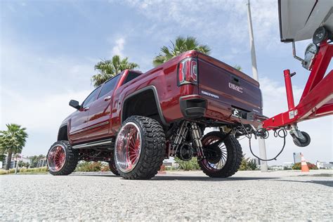 High Life Red Lifted GMC Sierra Denali — CARiD.com Gallery