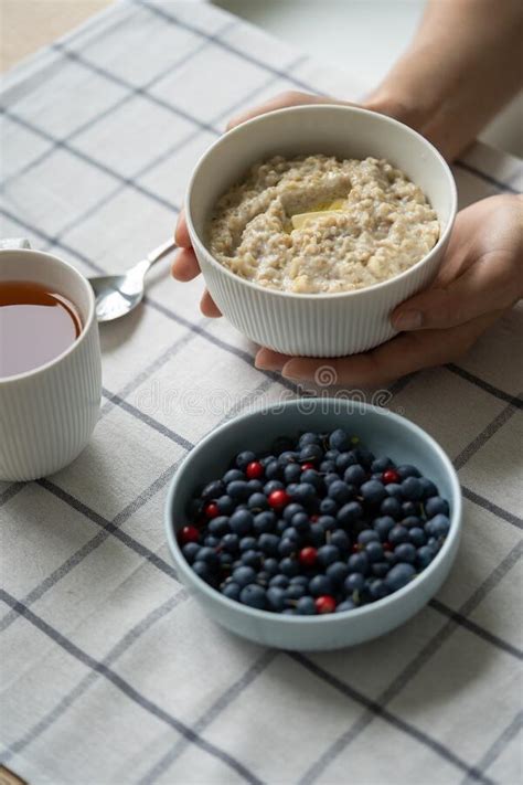 Healthy Food Breakfast With Oatmeal Porridge In Bowl With Summer