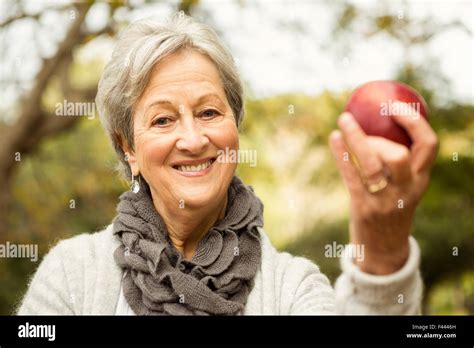 Senior Woman In The Park Stock Photo Alamy