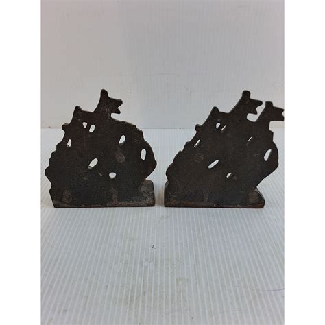 Pair of Cast Iron Book Ends - Bodnarus Auctioneering