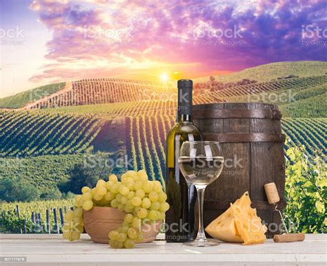 White Wine With Barrel On Vineyard In Chianti Tuscany Italy Stock Photo