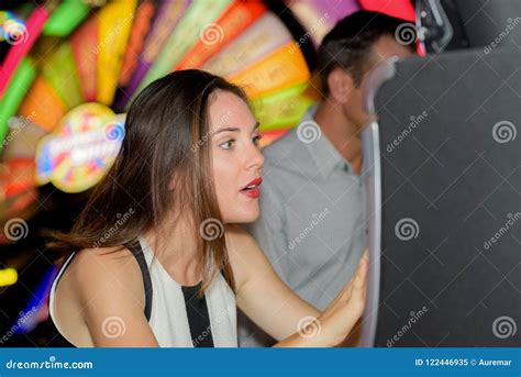 Excited Lady Playing Arcade Game Stock Image Image Of Action Fortune