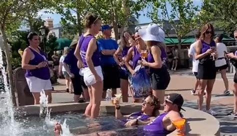 Video: Guests Use France Pavilion Fountain in EPCOT as a Pool | Chip ...