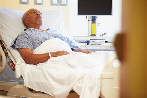 Senior Male Patient Resting In Hospital Bed Stock Photo Image Of