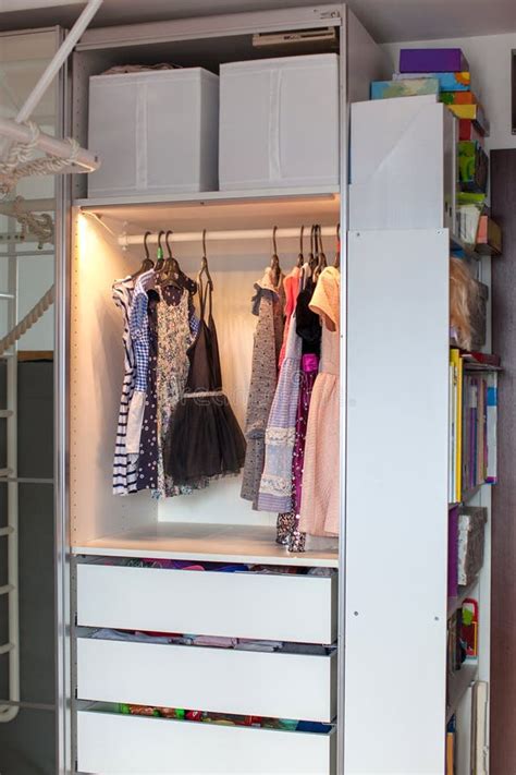 Storage in wardrobe. stock photo. Image of dress, fold - 179097096