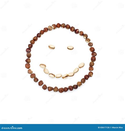 Healthy Diet Concept Smiley Face Arranged From Dry Brawn Hazelnuts