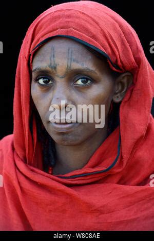 Afar Woman With Tattoos Skin Scarification On Her Face Breastfeeding