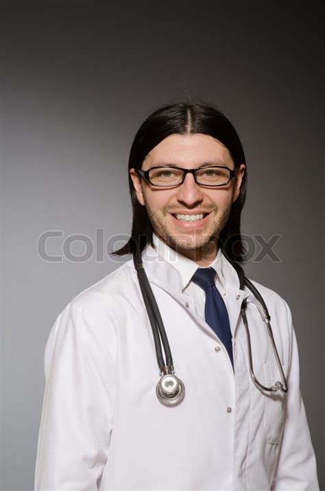 Young doctor with stethoscope in ... | Stock image | Colourbox