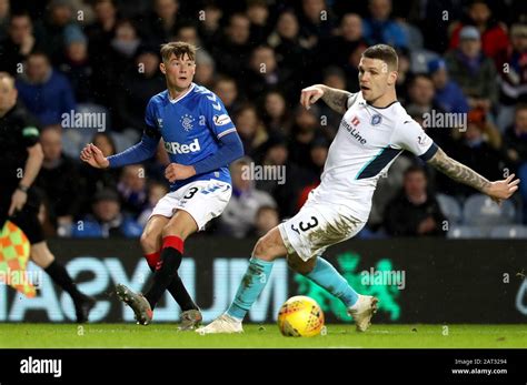 Rangers Nathan Patterson Left And Stranraer S Jordan Allan In Action