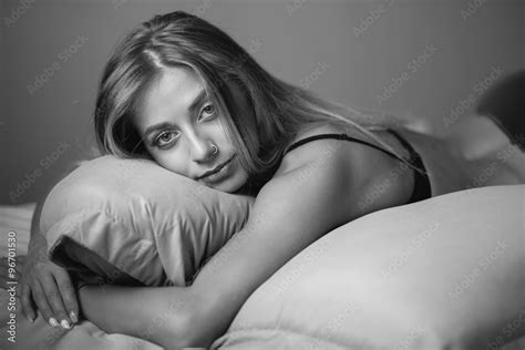 Sexy Beautiful Blonde Woman Lying In Bed In Sensual Lingerie Stock Photo Adobe Stock