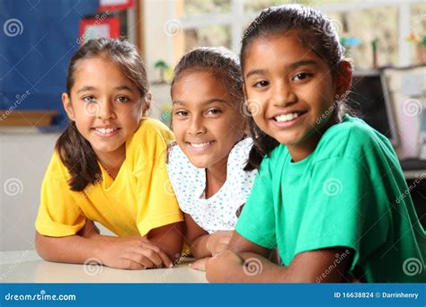 Three Young Primary School Girls Sitting in Class Stock Photo - Image ...