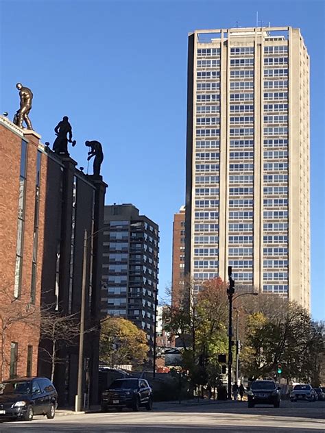 Blue sky, Grohmann Museum, and Juneau Village Towers | Katherine Wikoff