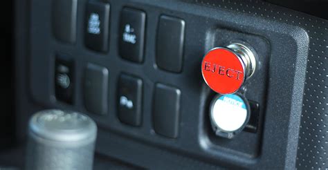 Someone Made A Red ‘eject Button For Your Cars Cigarette Lighter