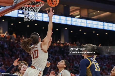 Texas Longhorns Guard Shay Holle Makes A Reverse Layup During The