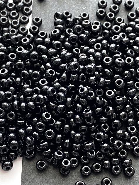 black seed bead size   black beads tiny black  beads