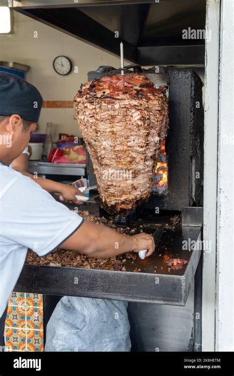 Mexican food Trompo Pastor tacos al pastor, beef stacked in sauce with ...