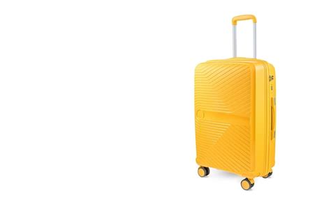 Premium Photo | Suitcase isolated on white yellow fashionable travel ...