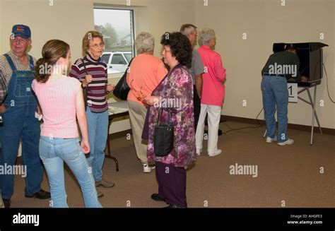 Standing in line to vote hi-res stock photography and images - Alamy